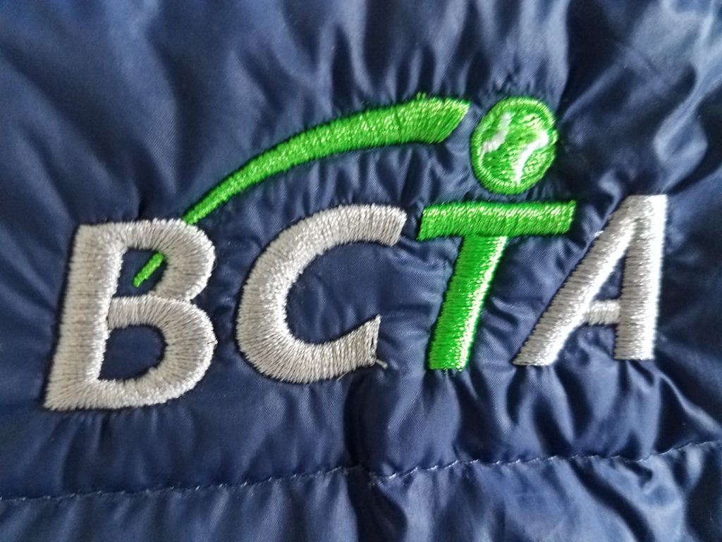 Image of detail of BCTA logo embroidery.