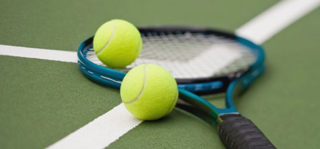 Image of racket and tennis balls.